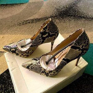 Brand new Aldo Stessy snake skin. Size 9 heels.